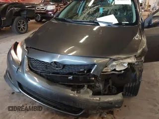 2010 Toyota Corolla with VIN 2T1BU4EE8AC510757, listed as a IAAI auction lot 41589152 with 164,857 mi miles. Bid and sale history available at carsss.com. Image 6.