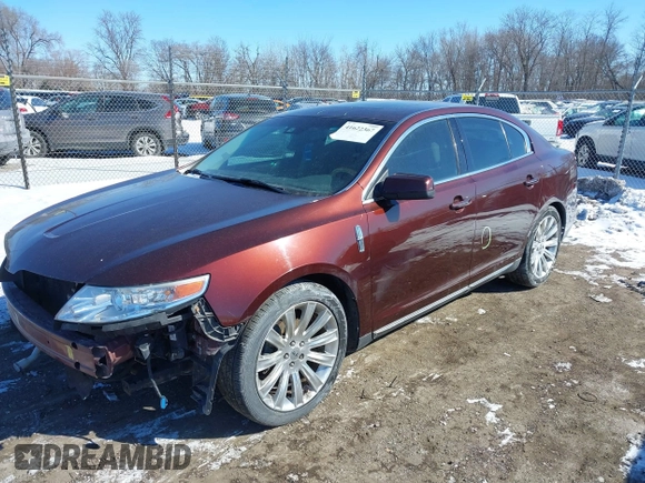 2012 Lincoln MKS with VIN 1LNHL9ER7CG803675, listed as a IAAI auction lot 41622367 with 128,157 mi miles. Bid and sale history available at carsss.com. Image 2.