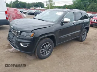 2022 Jeep Grand Cherokee Limited with VIN 1C4RJFBG2NC140638, listed as a IAAI auction lot 42601869 with 43,868 mi miles and . Bid and sale history available at DreamBid. Image 2.