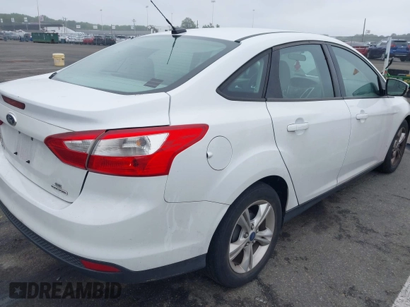 2013 Ford Focus SE with VIN 1FADP3F29DL306051, listed as a IAAI auction lot 42457611 with 86,817 mi miles and . Bid and sale history available at DreamBid. Image 4.