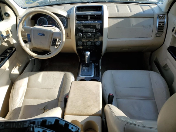 2012 Ford Escape Limited z VIN 1FMCU0EG9CKA20453, wystawiony jako Copart lot #56009755 z przebiegiem 190 000 mil mil oraz Szkoda całkowita • Salvage title. Historia ofert i sprzedaży dostępna na DreamBid. Obrazek 8.