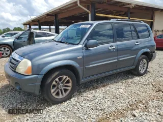 2005 Suzuki XL7 LX z VIN JS3TY92VX54102488, wystawiony jako Copart lot #56700595 z przebiegiem 169 827 mil mil oraz Szkody całkowita. Historia ofert i sprzedaży dostępna na DreamBid. Obrazek 1.