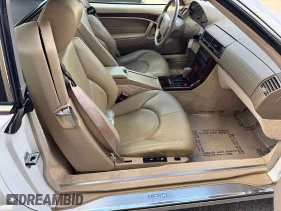 1998 Mercedes-Benz SL 500 z VIN WDBFA67F7WF158652, wystawiony jako Copart lot #65480405 z przebiegiem 91 401 mil mil oraz Czysty tytuł • Clean title. Historia ofert i sprzedaży dostępna na DreamBid. Obrazek 6.