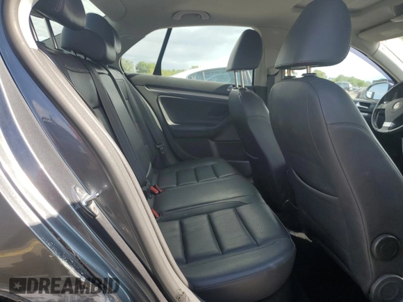 2009 Volkswagen Jetta SE with VIN 3VWRZ71K79M168084, listed as a Copart auction lot 57854825 with 150,986 mi miles and Salvage title. Bid and sale history available at DreamBid. Image 10.