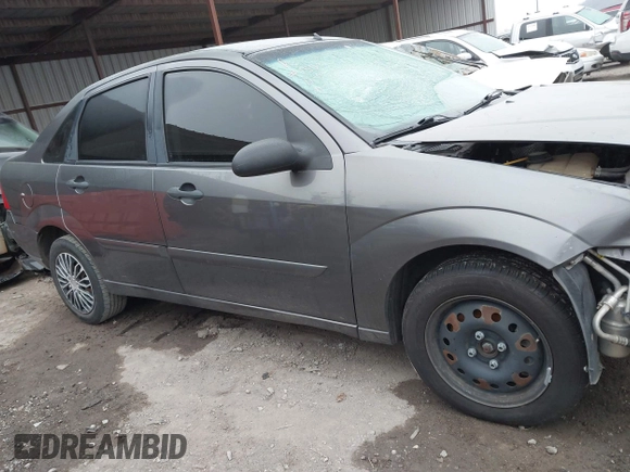 2007 Ford Focus S with VIN 1FAFP34NX7W158498, listed as a IAAI auction lot 41241970 with 119,933 mi miles and . Bid and sale history available at carsss.com. Image 14.