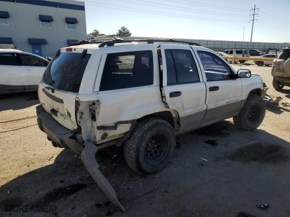 2002 Jeep Grand Cherokee Laredo with VIN 1J4GW48S72C298133, listed as a Copart auction lot 43973315 with 266,437 mi miles and Salvage Title. Bid and sale history available at carsss.com. Image 3.