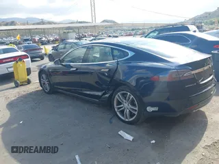 2013 Tesla Model S with VIN 5YJSA1CN8DFP07177, listed as a IAAI auction lot 42127797 with 75,227 mi miles and . Bid and sale history available at DreamBid. Image 3.