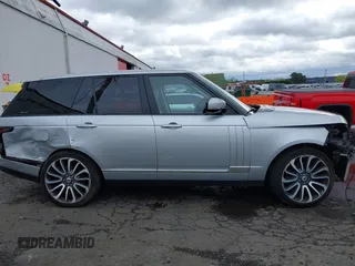 2015 Land Rover Range Rover HSE z VIN SALGS2VF6FA204430, wystawiony jako IAAI lot #41912280 z przebiegiem 82 812 mil mil oraz . Historia ofert i sprzedaży dostępna na DreamBid. Obrazek 13.