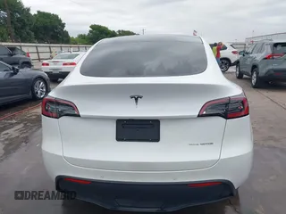 2022 Tesla Model Y Long Range z VIN 7SAYGDEE2NF420882, wystawiony jako IAAI lot #42023642 z przebiegiem 19 783 mil mil oraz . Historia ofert i sprzedaży dostępna na DreamBid. Obrazek 16.
