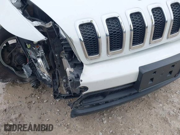 2014 Jeep Cherokee Latitude with VIN 1C4PJMCSXEW150735, listed as a IAAI auction lot 42020944 with 76,303 mi miles and . Bid and sale history available at carsss.com. Image 18.