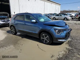 2025 Kia Niro SX Touring with VIN KNDCT3LEXS5235850, listed as a Copart auction lot 52300695 with 1,980 mi miles and Salvage Title. Bid and sale history available at carsss.com. Image 4.