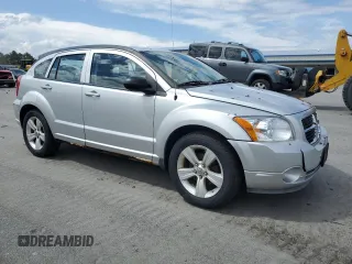 2012 Dodge Caliber SXT with VIN 1C3CDWDA2CD535730, listed as a Copart auction lot 55927895 with 67,391 mi miles and Clean Title. Bid and sale history available at DreamBid. Image 4.