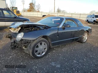 2002 Ford Thunderbird Hardtop Premium with VIN 1FAHP60A42Y127743, listed as a Copart auction lot 84723244 with Not Provided miles and Salvage Title. Bid and sale history available at DreamBid. Image 1.