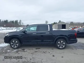 2018 Honda Ridgeline RTL-E z VIN 5FPYK3F78JB002172, wystawiony jako IAAI lot #41528764 z przebiegiem 64 566 mil mil oraz . Historia ofert i sprzedaży dostępna na DreamBid. Obrazek 15.
