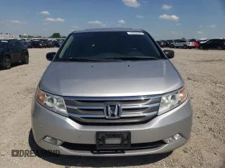 2012 Honda Odyssey Touring with VIN 5FNRL5H94CB009952, listed as a Copart auction lot 54322695 with 135,551 mi miles and Salvage title. Bid and sale history available at DreamBid. Image 5.