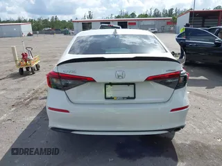 2022 Honda Civic Sedan Sport with VIN 2HGFE2F52NH532042, listed as a IAAI auction lot 41594967 with 76,809 mi miles. Bid and sale history available at carsss.com. Image 16.