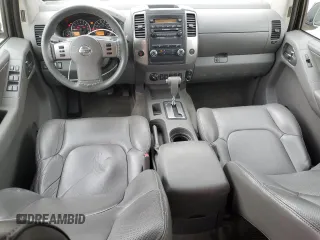 2011 Nissan Frontier Pro-4X with VIN 1N6AD0EVXBC433028, listed as a Copart auction lot 57653305 with 144,753 mi miles and Salvage title. Bid and sale history available at DreamBid. Image 8.