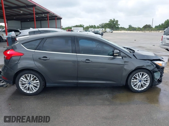 2017 Ford Focus Titanium with VIN 1FADP3N20HL210364, listed as a IAAI auction lot 42130643 with 132,312 mi miles and . Bid and sale history available at DreamBid. Image 14.