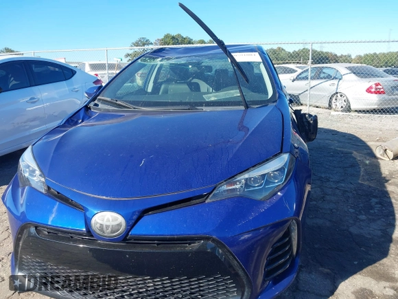 2017 Toyota Corolla L with VIN 2T1BURHE0HC937580, listed as a IAAI auction lot 40591004 with 112,411 mi miles and . Bid and sale history available at DreamBid. Image 12.