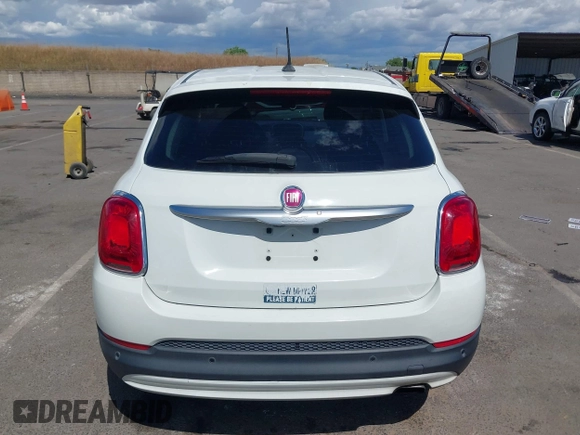 2016 FIAT 500X Lounge z VIN ZFBCFXDT0GP333273, wystawiony jako IAAI lot #42269130 z przebiegiem 98 707 mil mil oraz . Historia ofert i sprzedaży dostępna na DreamBid. Obrazek 16.