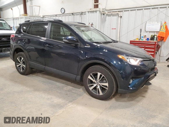 2018 Toyota RAV4 XLE with VIN JTMRFREV2JD254334, listed as a Copart auction lot 53079335 with 27,717 mi miles and Clean Title. Bid and sale history available at DreamBid. Image 4.
