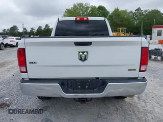 2018 Ram 1500 SLT z VIN 1C6RR6GG7JS303941, wystawiony jako IAAI lot #41942236 z przebiegiem 142 098 mil mil oraz . Historia ofert i sprzedaży dostępna na DreamBid. Obrazek 17.