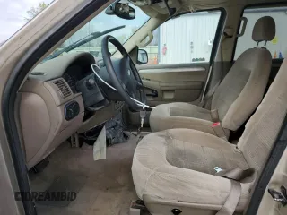 2004 Ford Explorer XLT z VIN 1FMZU73K44UB98061, wystawiony jako Copart lot #52914385 z przebiegiem Nie podano mil oraz Szkoda całkowita • Salvage title. Historia ofert i sprzedaży dostępna na DreamBid. Obrazek 7.