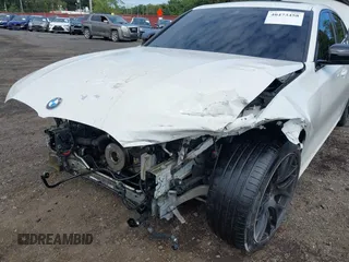 2021 BMW 3 Series M340i xDrive with VIN 3MW5U9J01M8B89618, listed as a IAAI auction lot 40473458 with 58,438 mi miles. Bid and sale history available at carsss.com. Image 6.
