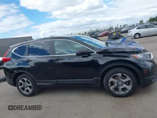 2019 Honda CR-V EX with VIN 5J6RW1H56KA030445, listed as a IAAI auction lot 42043513 with 137,087 mi miles. Bid and sale history available at carsss.com. Image 14.