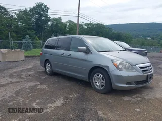 2007 Honda Odyssey EX with VIN 5FNRL38427B087869, listed as a IAAI auction lot 42642308 with 70,956 mi miles and . Bid and sale history available at DreamBid. Image 1.