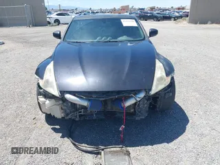 2013 Nissan 370Z z VIN JN1AZ4EH8DM880849, wystawiony jako IAAI lot #42131189 z przebiegiem Nie podano mil oraz . Historia ofert i sprzedaży dostępna na DreamBid. Obrazek 13.