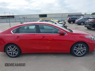 2021 Kia Forte EX with VIN 3KPF54AD1ME404443, listed as a IAAI auction lot 40952314 with 108,035 mi miles and . Bid and sale history available at DreamBid. Image 14.