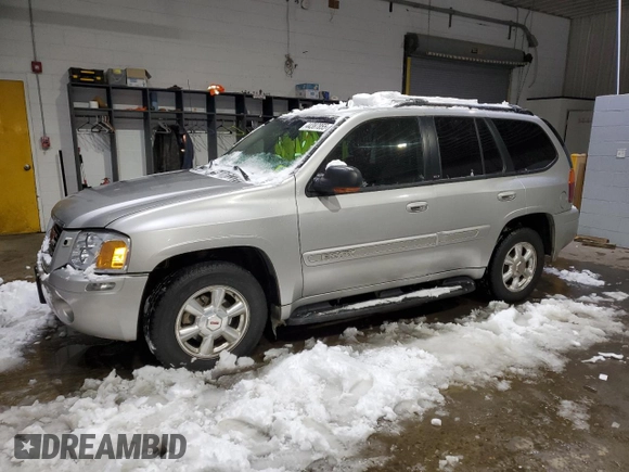 2005 GMC Envoy SLT with VIN 1GKDT13SX52287052, listed as a Copart auction lot 44387855 with 0 mi miles and Salvage Title. Bid and sale history available at carsss.com. Image 1.