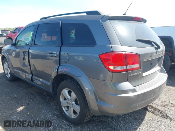 2013 Dodge Journey American Value with VIN 3C4PDCAB5DT509059, listed as a IAAI auction lot 42124093 with 162,904 mi miles and . Bid and sale history available at DreamBid. Image 3.
