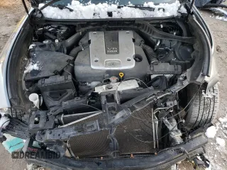 2015 Infiniti Q70 z VIN JN1BY1PR0FM830851, wystawiony jako Copart lot #87606685 z przebiegiem 116 148 mil mil oraz Szkoda całkowita • Salvage title. Historia ofert i sprzedaży dostępna na DreamBid. Obrazek 11.