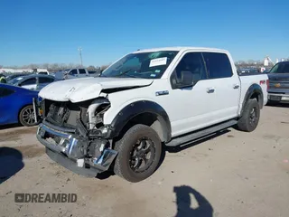 2015 Ford F-150 XLT with VIN 1FTEW1EF4FKD09118, listed as a IAAI auction lot 41414605 with 136,073 mi miles. Bid and sale history available at carsss.com. Image 2.