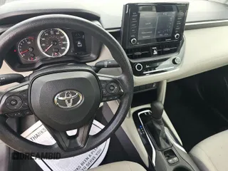 2022 Toyota Corolla Cross L with VIN 7MUAAAAG8NV017626, listed as a IAAI auction lot 42566409 with 49,073 mi miles and . Bid and sale history available at DreamBid. Image 2.