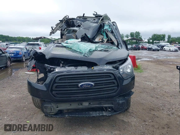 2018 Ford Transit with VIN 1FTYR2CM1JKA03238, listed as a IAAI auction lot 42427850 with Not provided miles and . Bid and sale history available at DreamBid. Image 13.