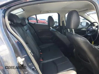 2018 Mazda 3 Touring z VIN 3MZBN1V30JM243211, wystawiony jako Copart lot #58324975 z przebiegiem 86 030 mil mil oraz Szkoda całkowita • Salvage title. Historia ofert i sprzedaży dostępna na DreamBid. Obrazek 10.