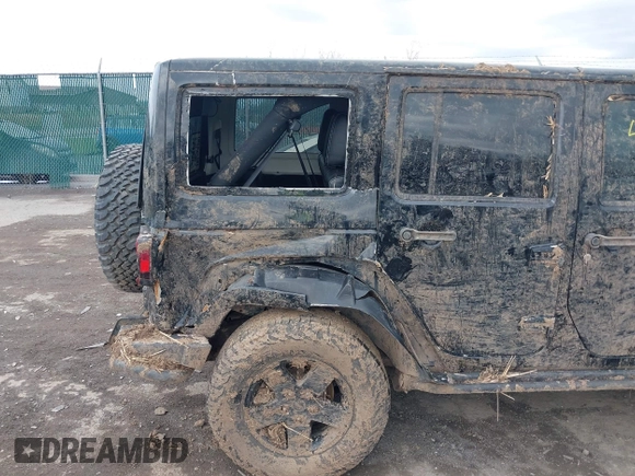 2012 Jeep Wrangler Unlimited Call of Duty MW3 z VIN 1C4BJWFG0CL202238, wystawiony jako IAAI lot #41956648 z przebiegiem 92 572 mil mil oraz . Historia ofert i sprzedaży dostępna na DreamBid. Obrazek 6.