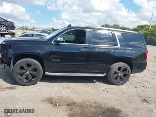 2015 Chevrolet Tahoe LTZ with VIN 1GNSCCKC7FR746028, listed as a IAAI auction lot 41674775 with 198,067 mi miles. Bid and sale history available at carsss.com. Image 15.