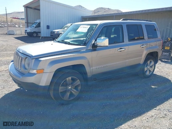 2014 Jeep Patriot Latitude with VIN 1C4NJRFB6ED883893, listed as a IAAI auction lot 41780864 with 119,610 mi miles. Bid and sale history available at carsss.com. Image 2.