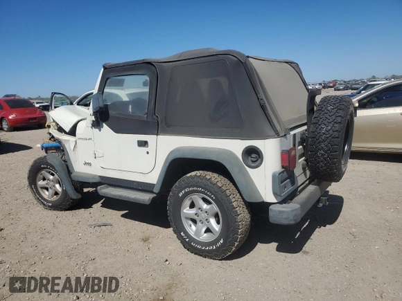 1997 Jeep Wrangler SE with VIN 1J4FY29PXVP411817, listed as a Copart auction lot 48755615 with 125,284 mi miles and Salvage Title. Bid and sale history available at DreamBid. Image 2.