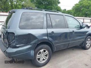 2005 Honda Pilot EX-L with VIN 5FNYF18565B046464, listed as a IAAI auction lot 41879495 with 228,021 mi miles. Bid and sale history available at carsss.com. Image 19.