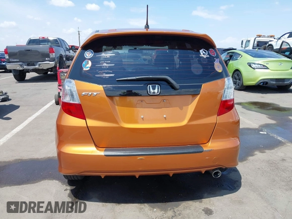 2009 Honda Fit Sport z VIN JHMGE88459S053122, wystawiony jako IAAI lot #42195267 z przebiegiem 47 349 mil mil oraz . Historia ofert i sprzedaży dostępna na DreamBid. Obrazek 16.