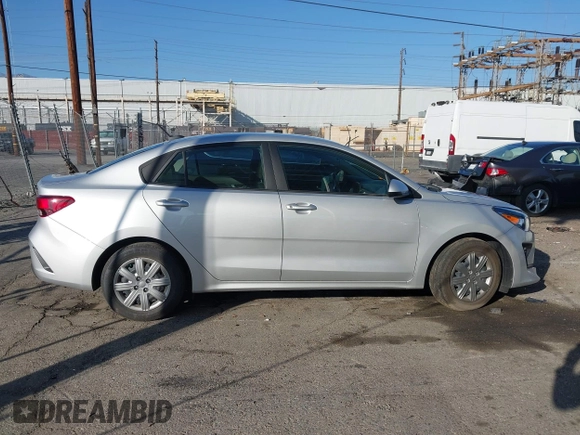 2023 Kia Rio LX with VIN 3KPA24AD1PE599290, listed as a IAAI auction lot 41023283 with 10,027 mi miles and . Bid and sale history available at DreamBid. Image 13.