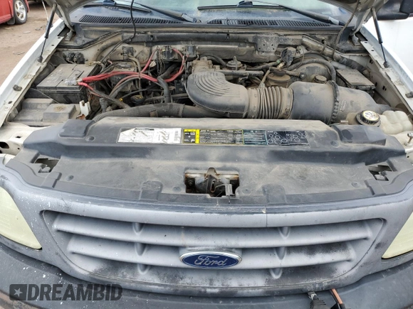 2002 Ford F-150 XL с VIN 1FTPF18L72NB43907, выставлен на аукционе Copart как лот 50898724 с пробегом 199 982 миль миль и На запчасти • Non repairable. История ставок и продаж доступна на DreamBid. Изображение 11.