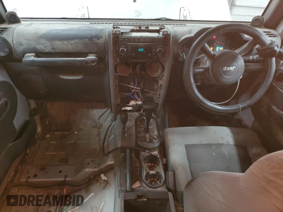 2008 Jeep Wrangler X с VIN 1J4FZ24138L526514, выставлен на аукционе Copart как лот 72569194 с пробегом 216 928 миль миль и Списание • Salvage title. История ставок и продаж доступна на DreamBid. Изображение 8.