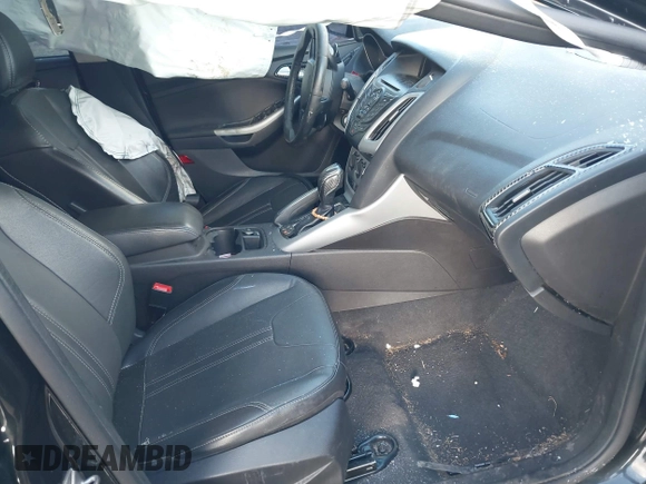 2013 Ford Focus SE z VIN 1FADP3F27DL342384, wystawiony jako IAAI lot #41474290 z przebiegiem 125 664 mil mil oraz . Historia ofert i sprzedaży dostępna na DreamBid. Obrazek 5.
