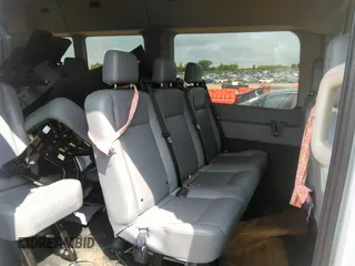 2018 Ford Transit Passenger XL with VIN 1FBAX2CMXJKB27794, listed as a IAAI auction lot 37406537 with 30,019 mi miles and . Bid and sale history available at DreamBid. Image 8.